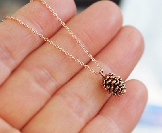 gilded pinecone necklaces as bridesmaids' gifts