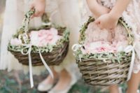 04 greenery accented woven flower girl baskets