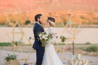 04 wooden plank triangle backdrop for a desert wedding