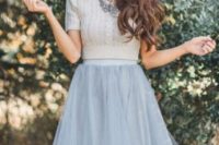 a modern glam look with a grey tulle skirt, a grey sweater and a statement necklace is a cool and lovely solution for a bridal shower