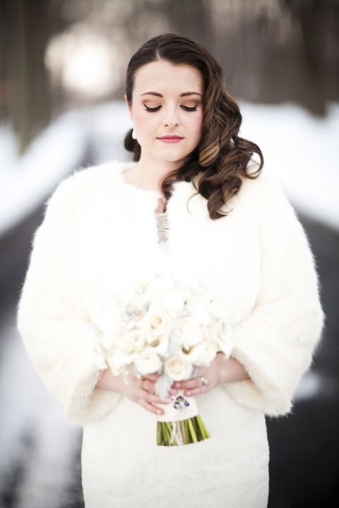 adorable white fur cover up complements your bridal looks