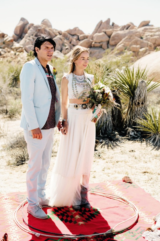 The groom rocked a dusty blue suit and suede shoes and a patterned t-shirt