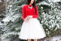 a lovely winter or Christmas bridal shower look with a white tutu, a red sweater, heels and a statement necklace