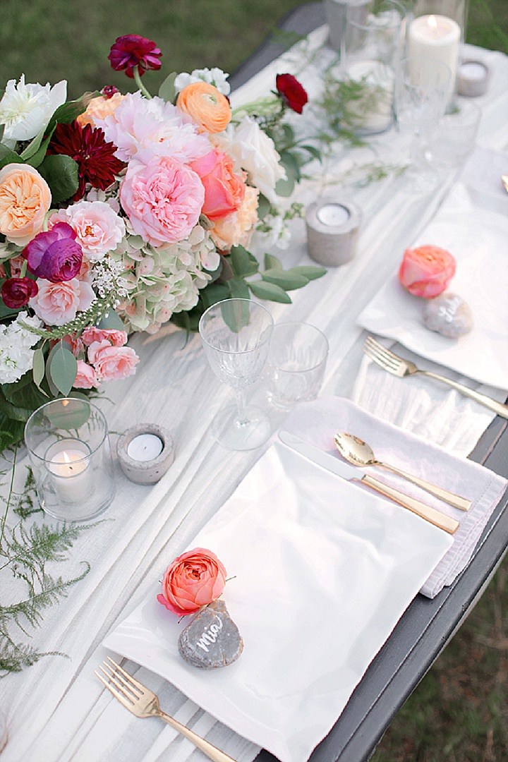 Peonies and rocks are a great idea for place cards