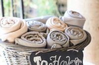10 favor blankets in a basket for guests