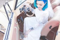 11 A retro car added to the shoot theme, and the bride’s tattoos made her look pop