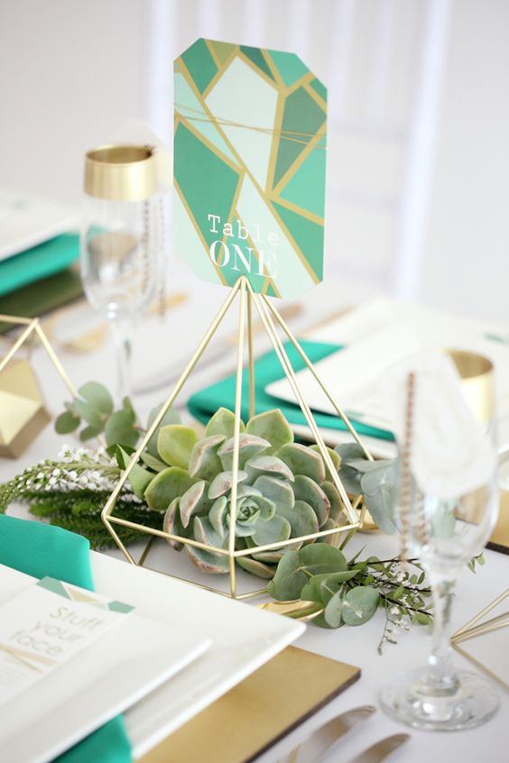 gold straws diamond table numbers with succulents inside