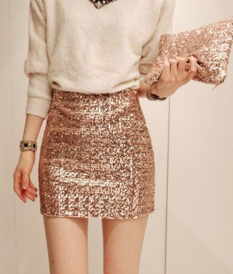 a classy outfit for a bridal shower with a white sweater, a sequin mini and clutch is a great idea for holiday parties, too