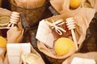 12 French wired basket wedding favors filled with fresh apricots, honey and local cheddar cheese