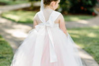 13 The flower girl in a rose quartz dress and a greenery crown looked like a little angle
