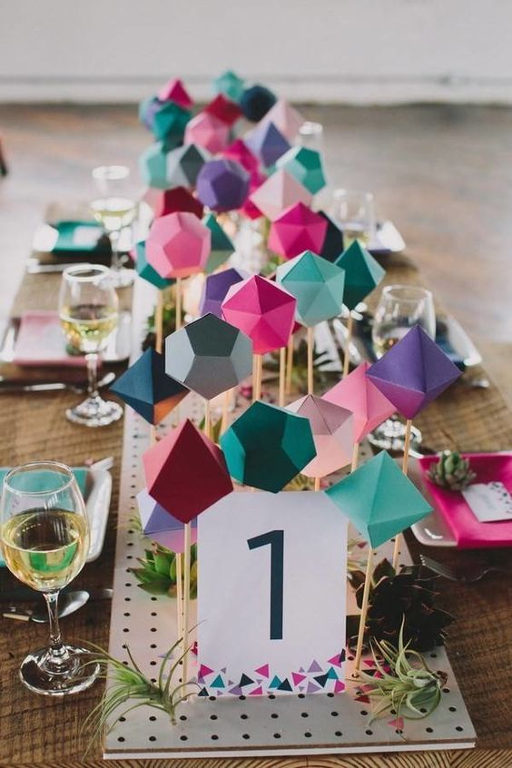 colorful folded paper table runner for a geometric tablescape