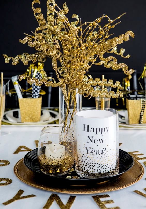 try coupling glimmering golds with bright whites and bursts of black for a standout tablescape
