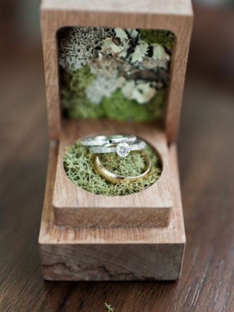 wooden ring box with moss inside