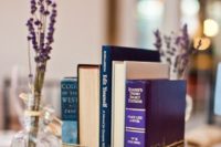 16 bundled book centerpiece with lavender