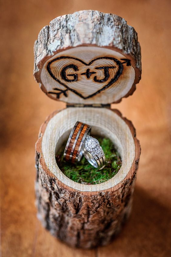 woodburnt stump ring box filled with moss