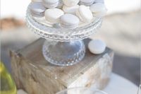 19 white and silver macarons are a great treat for a winter beach wedding