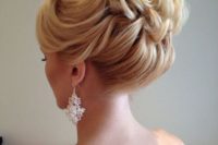 20 wavy hair pulled up into a braided wedding hairstyle
