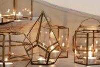 22 copper geo lanterns in various shapes to decorate the ceremony