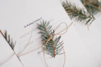 22 decorate menus and programs with fir branches for a cozy touch