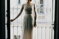 23 long sleeve dress with a beaded bodice and a flowing skirt is perfect for a relaxed wedding