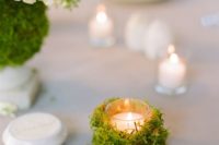 23 moss covered votive looks more original than a usual one