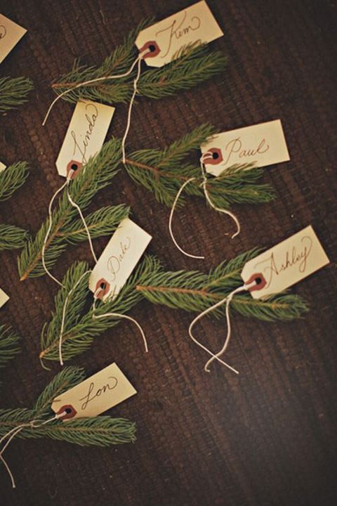 fir branches as place card holders