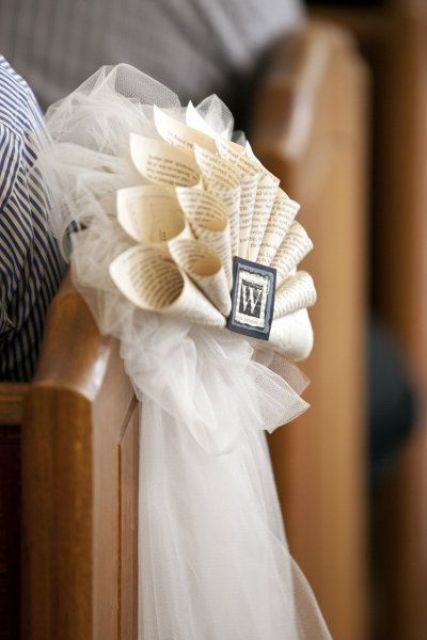 book page fans with monograms to decorate your wedidng aisle