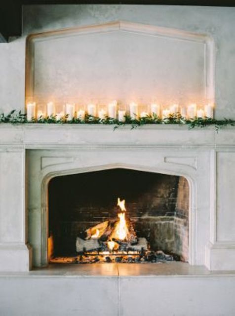 decorate the fireplace mantles with candles and baby's breath to use it as an altar