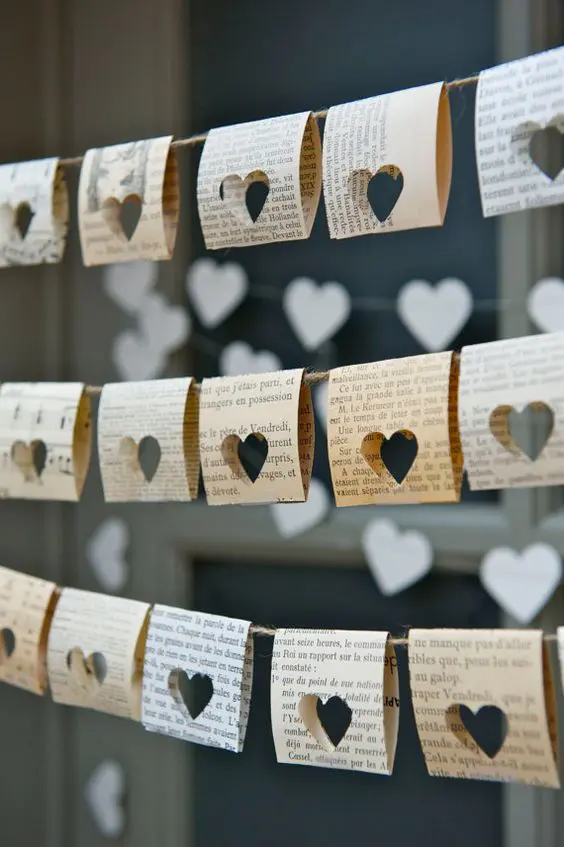 book page bunting with cutout hearts