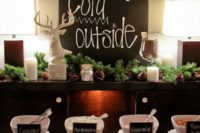 26 great idea for decorating a hot cocoa bar with fir, chalkboards and pinecones