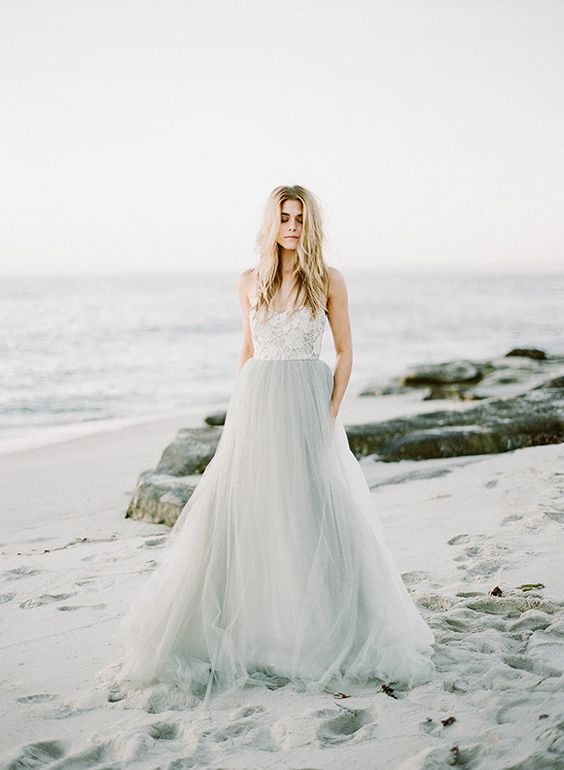 bridal separate with a tulle grey skirt and a white lace top