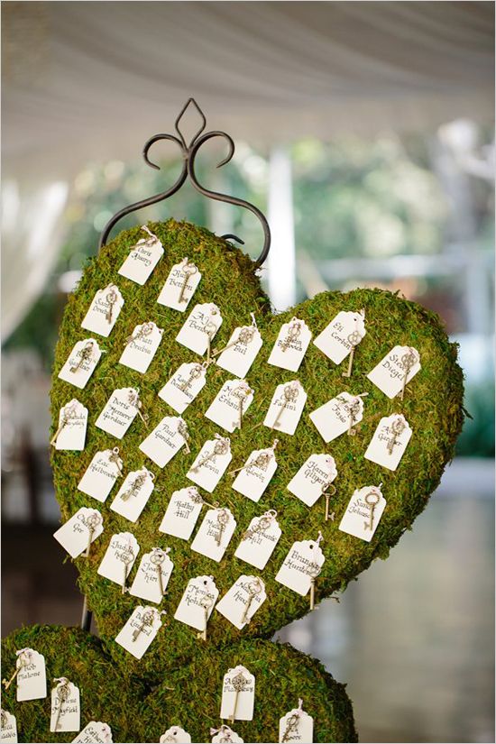 vintage escort cards pinned to hearts