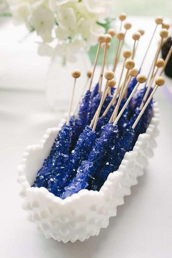 midnight blue crystal pops made of sugar are easy and cheap wedding favors