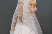 31 long curls down with a beaded juliet cap veil of tulle