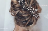 32 bridal updo with rhinestone hairpieces