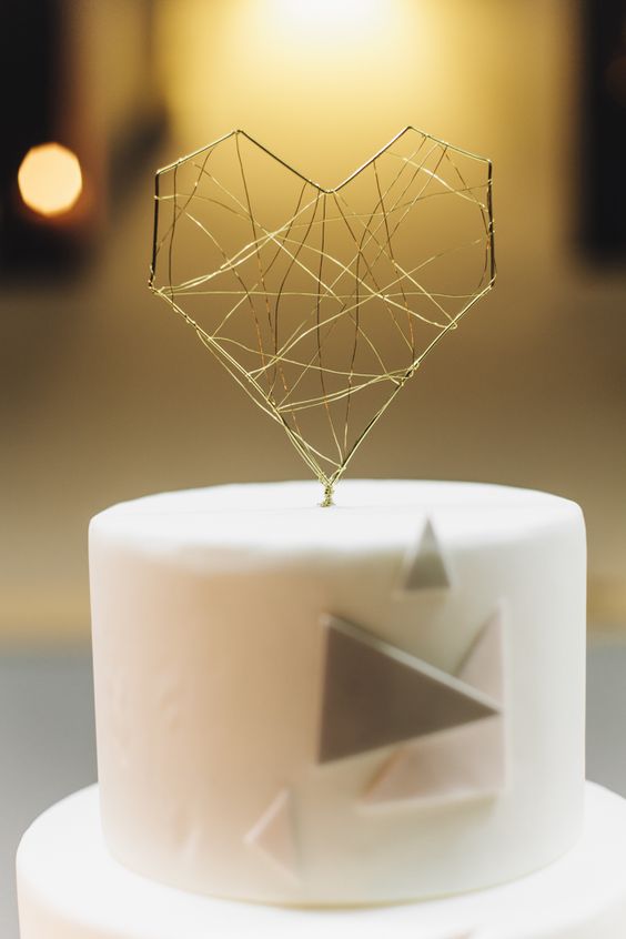 cute gold geo heart cake topper for a geometric wedding cake