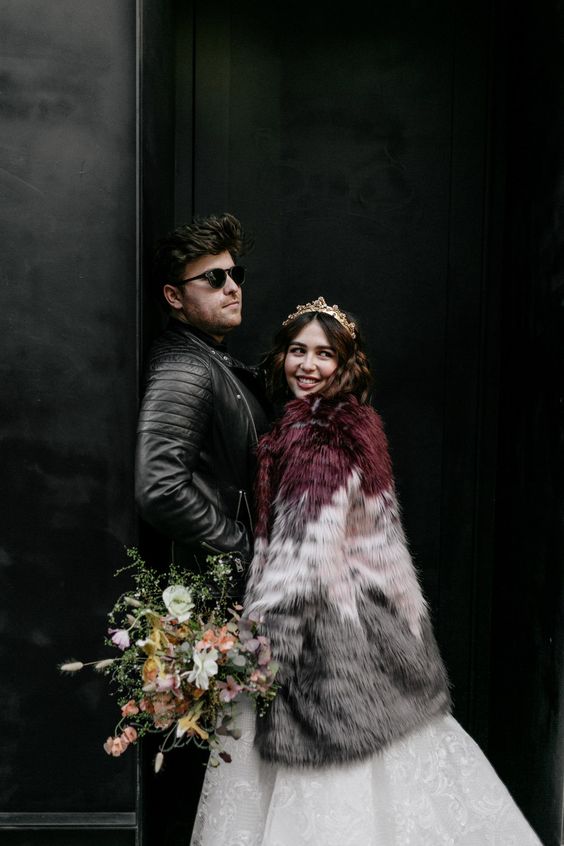 a bold and edgy faux fur color block coat is a gorgeous statement for a bridal look, it will keep you warm and bold