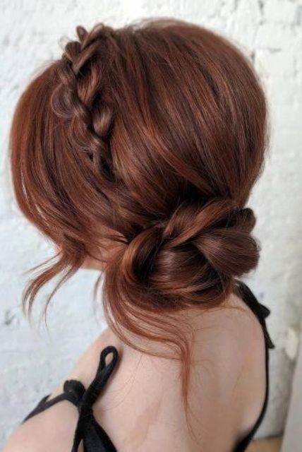 a braided halo plus a braided low bun and some locks down is a cool idea of a wedding updo, for any bride