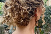 a catchy curly wedding updo will fit medium and long hair, leave some curls down to frame the face