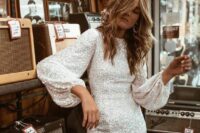 a silver sequin midi dress with a high neckline and puff sleeves is a catchy and bold idea for a winter bridal shower
