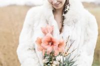 a white faux fur coat like this one will keep you warm for sure, whatever the weather is and you’ll enjoy your wedding