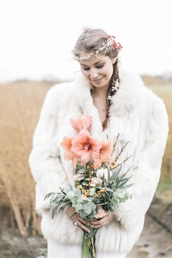 a white faux fur coat like this one will keep you warm for sure, whatever the weather is and you'll enjoy your wedding