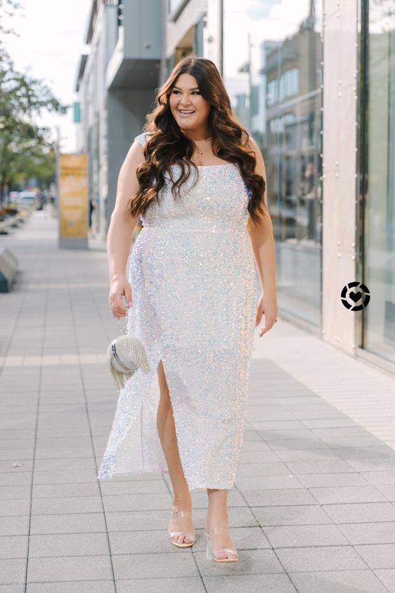 a white sequin midi dress with straps, a square neckline, clear shoes and an embellished bag for a holiday bridal shower