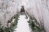 a lovely winter wonderland wedding aisle
