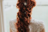 gorgeous long copper hair in a twisted low ponytail, with a bump on top and celestial hair pins is amazing for any season