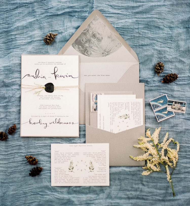 The invitations were forest-inspired and with images of a blue moon that the bride wanted