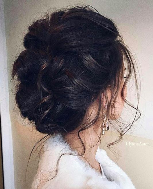 braided updo with tiny locks all over