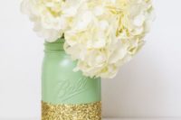 03 mint and giltter mason jar with white hydrangeas for a wedding centerpiece