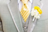 04 dove grey suit, a crispy white shirt and a striped yellow tie