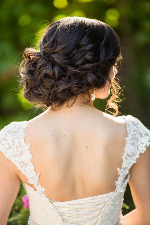 elegant messy updo with no accessories looks chic